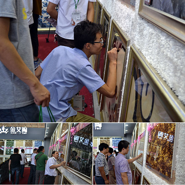 现场客商仔细观摩香蕉APP直播陶2.0道厚系列爆晶微晶石